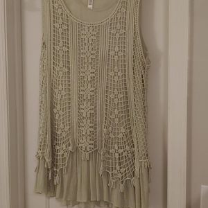 Boutique style sleeveless shirt .